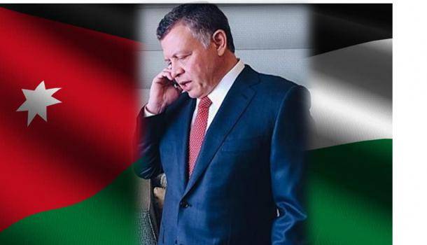 King, Iraqi PM discuss ties over phone